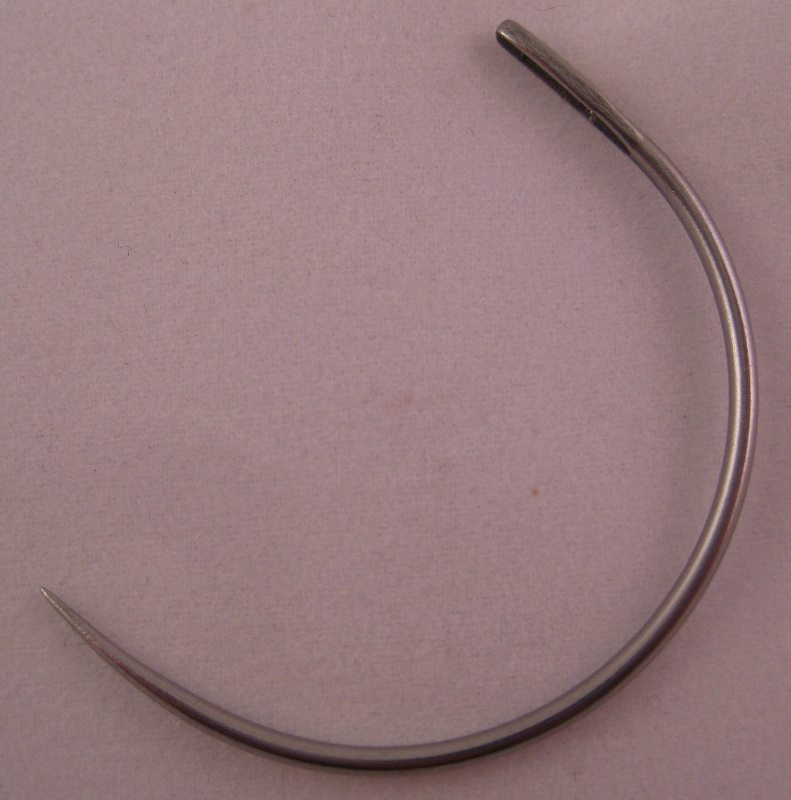 Curved Metal Packing Needle